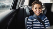 child in booster seat