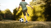 child playing soccer