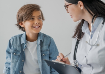 Teen boy being examined