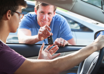 Father Handing Son Keys